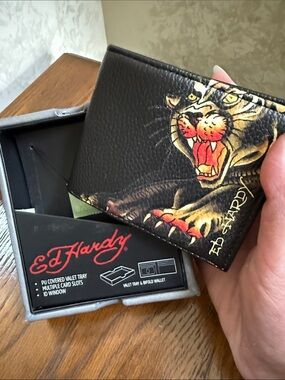 Ed Hardy Black Wallet with Fierce Tiger Artwork. Multiple card slots. ID window.